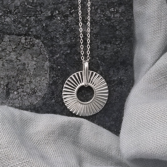 tactile silver disk pendant necklace